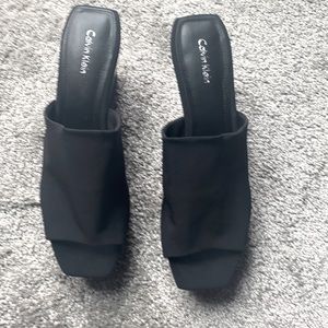 New never worn black sandals.